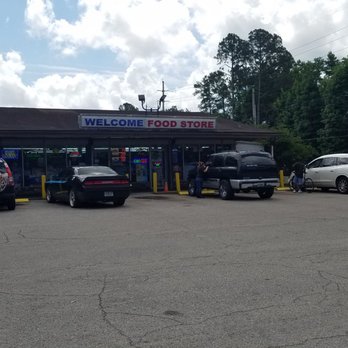 Welcome Food Store - cars parked in a parking lot - Convenience Stores Near Me - Jacksonville, Florida Welcome Food Store - cars parked in a parking lot - Convenience Stores Near Me - Jacksonville, Florida