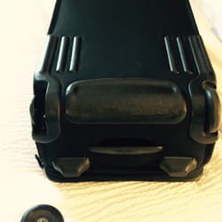 American Airlines - Broken Tumi luggage courtesy of American airlines!