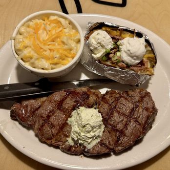 Hideout Steakhouse & BBQ - Rib Eye - 16oz Loaded Baked Potato Smoked Mac & Cheese - Barbeque Near Me - Casa Grande, Arizona Hideout Steakhouse & BBQ - Rib Eye - 16oz Loaded Baked Potato Smoked Mac & Cheese - Barbeque Near Me - Casa Grande, Arizona