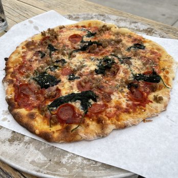 Howell's Kitchen and Bar - 8" 8" Triple Meat Pizza - Pizza Near Me - Atlanta, Georgia