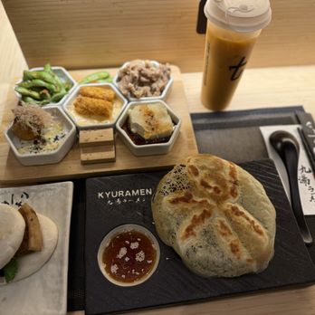 Kyuramen x TBaar - Lancaster - Pan Fried Gyoza Dumplings 6Pcs, Kyuramen Bao Buns ( 1Pc ), appetizer sampler and Thai Iced Tea - Ramen Near Me - Lancaster, Pennsylvania Kyuramen x TBaar - Lancaster - Pan Fried Gyoza Dumplings 6Pcs, Kyuramen Bao Buns ( 1Pc ), appetizer sampler and Thai Iced Tea - Ramen Near Me - Lancaster, Pennsylvania