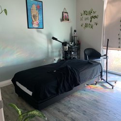 Relaxing massage bed with fresh sheets
