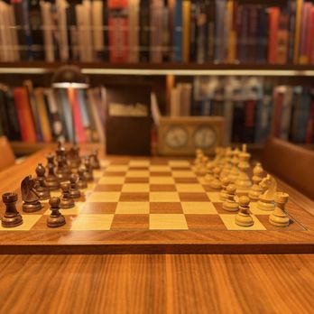 Ambassade Hotel - Chess set by the cafeteria - Hotels Near Me - Amsterdam, New Hampshire Ambassade Hotel - Chess set by the cafeteria - Hotels Near Me - Amsterdam, New Hampshire