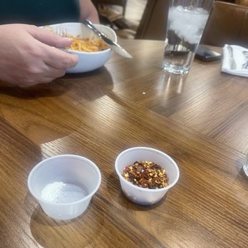 Dolce Vita Ristorante - Plastic tin Parmesan and red flakes to feed 3 people - Coffee & Tea Near Me - Aurora, Colorado Dolce Vita Ristorante - Plastic tin Parmesan and red flakes to feed 3 people - Coffee & Tea Near Me - Aurora, Colorado
