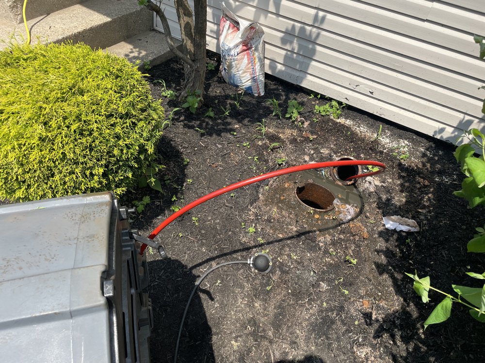 Slide of New Day Drain Services