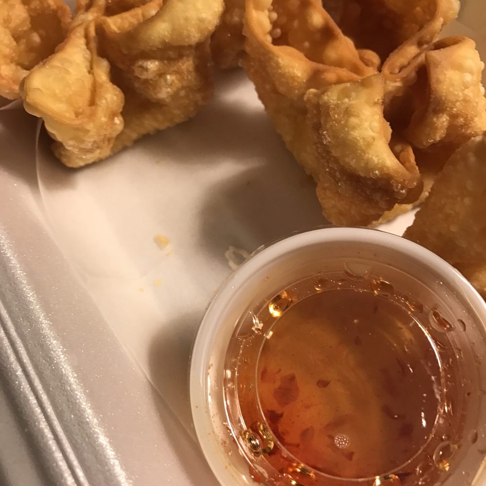 Thai Basil - Crab Rangoon with sweet sauce - crunchy and delicious. Ample cream cheese. - Thai Near Me - Madison, Wisconsin Thai Basil - Crab Rangoon with sweet sauce - crunchy and delicious. Ample cream cheese. - Thai Near Me - Madison, Wisconsin