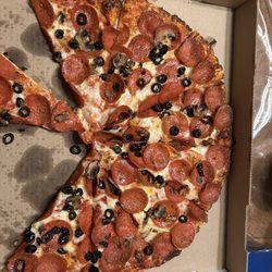 Pioneer Pizza & Family Pub - Ordered a pepperoni pizza with olives and mushrooms . Next to no toppings on my pizza. Disappointment. Wouldn't order from here again .
