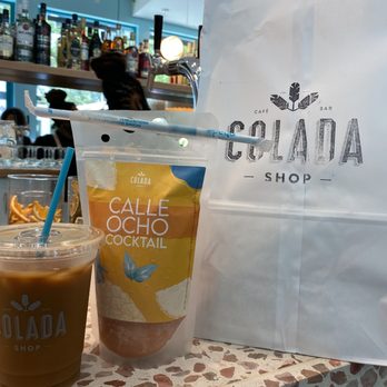 Colada Shop - Americano over ice, guava slush, to go order - Cocktail Bars Near Me - Fairfax, Virginia
