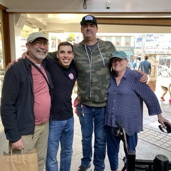 Tower 12 - Me, an unidentified Tower 12 employee, Brady the manager, and Sandy my wife, after a fabulous experience at Tower 12. - Bars Near Me - Hermosa Beach, California
