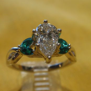 Qualicum Jewellers - Custom Made to order O.85 ct. Pear /14 kt White gold /Emerald Marquise accents..Stunning - Jewelry Near Me - Qualicum Beach, British Columbia Qualicum Jewellers - Custom Made to order O.85 ct. Pear /14 kt White gold /Emerald Marquise accents..Stunning - Jewelry Near Me - Qualicum Beach, British Columbia