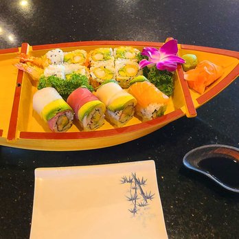 Tokyo - the "boat" they delivered my rolls on. Plenty of pickled ginger and wasabi too! - Japanese Near Me - Tampa, Florida