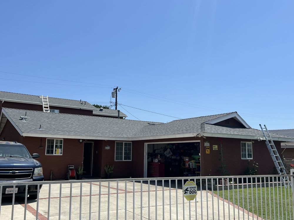 Slide of Green Shield Roofing