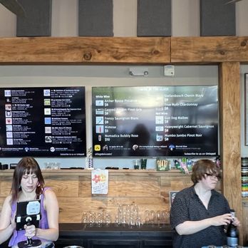 Village Beverage - Bar area with drink menus displayed - Beer Bar Near Me - Summerfield, North Carolina Village Beverage - Bar area with drink menus displayed - Beer Bar Near Me - Summerfield, North Carolina