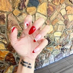 Sparkle 10 Nail and Spa - Hot weather calls for hot nails! Red never goes out of style.