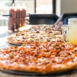 Fox & Hound Smokehouse Grill & Bar - Lake Tahoe - House made crust it's not thin but not super thick either. Just right in the middle. On top of that is some wonderful sauce...