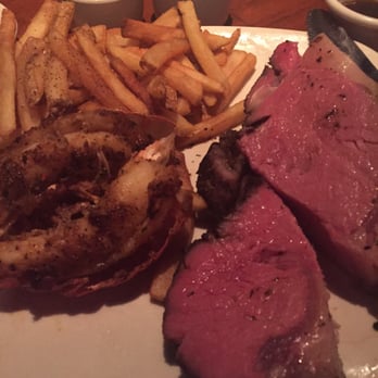 Outback Steakhouse - Steak and lobster tails with fries. - Steakhouses Near Me - Pompano Beach, Florida Outback Steakhouse - Steak and lobster tails with fries. - Steakhouses Near Me - Pompano Beach, Florida