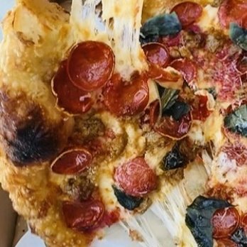 Truly Pizza - Cheese pull - Pizza Near Me - Dana Point, California Truly Pizza - Cheese pull - Pizza Near Me - Dana Point, California