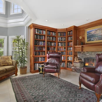 Logans Run Construction - a living room with a fireplace - General Contractors Near Me - Carlsbad, California Logans Run Construction - a living room with a fireplace - General Contractors Near Me - Carlsbad, California
