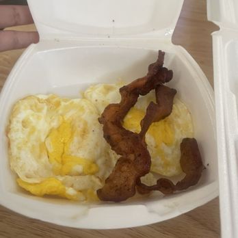 Uncle Joes Tacos - Bacon and egg with plate - Tacos Near Me - San Antonio, Texas Uncle Joes Tacos - Bacon and egg with plate - Tacos Near Me - San Antonio, Texas