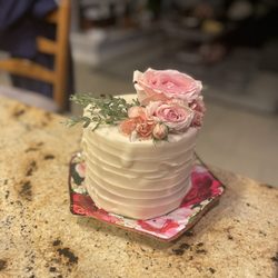 Suzanne's Bakery - Chocolate cake with chocolate chips , butter cream frosting.