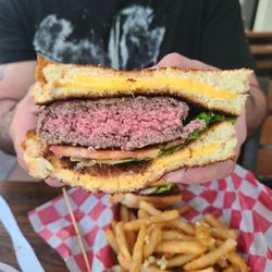 Bronx Burger House - Chris M. Bronx Burger Lusciousness...temp on point! Two grilled cheeses, engulfing a huge beef patty