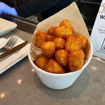 Bar Tatami - a bowl of tater tots and a plate of chicken nuggies - Asian Fusion Near Me - Livermore, California