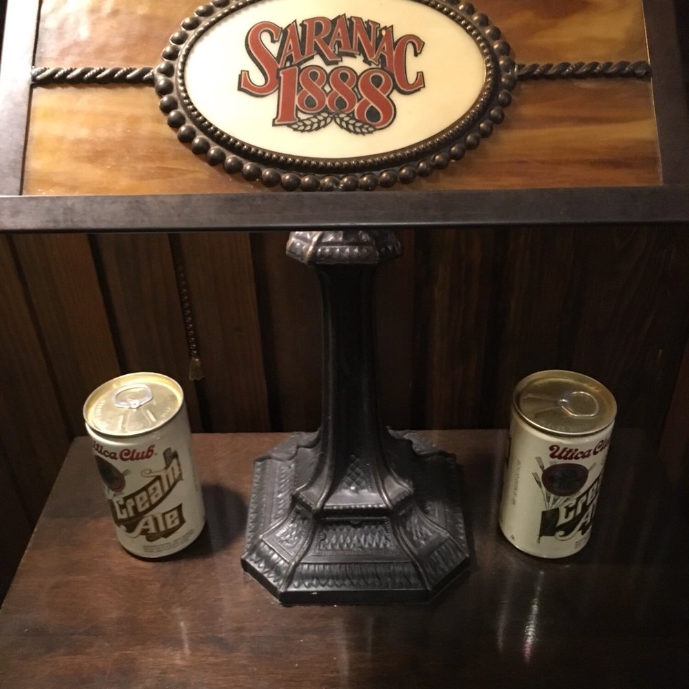 Matt F X Brewing - a table with a lamp and two cans of beer - Breweries Near Me - Utica, New York Matt F X Brewing - a table with a lamp and two cans of beer - Breweries Near Me - Utica, New York