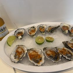 12 oysters. Prepare how you like it. I love a sprinkle of salt, lime juice and the homemade sauce they have 