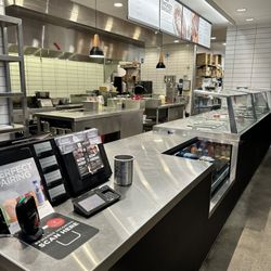 Chipotle Mexican Grill - Counter covered in food bits and no staff for 5 minutes and order 15 minutes later