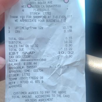 7-Eleven - a person holding a receipt in their hand - Convenience Stores Near Me - Westminster, California 7-Eleven - a person holding a receipt in their hand - Convenience Stores Near Me - Westminster, California