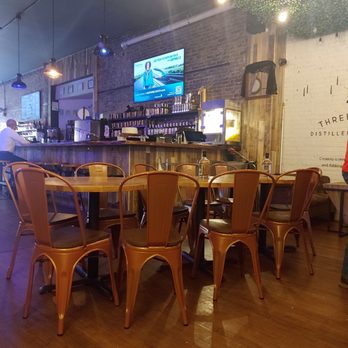 Three Bridges Distillery And Taproom - Interior view of the bar area. - Distilleries Near Me - Midland, Michigan