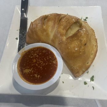Napoli's Italian Grill - Calzone as big as your head - Italian Near Me - Montgomery, Texas Napoli's Italian Grill - Calzone as big as your head - Italian Near Me - Montgomery, Texas