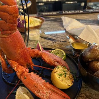 Lobster House Seafood Restaurant - Whole lobster with baby potatoes - American Near Me - Myrtle Beach, South Carolina