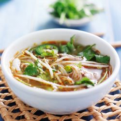 Saigon District One - Our rare sliced beef pho delivers a deeply aromatic broth, tender cuts of beef, and fresh herbs that hit all the right notes.