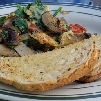 Marketside Restaurant - Specialty omelette with spinach and mushrooms. Rye toast on the side. - Breakfast & Brunch Near Me - Niagara Falls, New York Marketside Restaurant - Specialty omelette with spinach and mushrooms. Rye toast on the side. - Breakfast & Brunch Near Me - Niagara Falls, New York