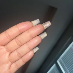 MT Nails - Nails grow the length of the acrylic 2 months with 3 different fill ins 1 broken nail due to workplace In 2 months