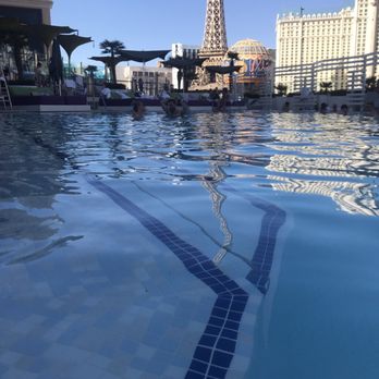 Boulevard Pool - No sun, no fun- everyone is probably behind me trying to catch that one sliver - Swimming Pools Near Me - Las Vegas, Nevada