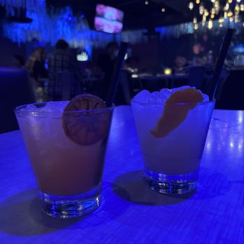 Society - BLOODY PRICK- Tequila/ Blood orange/ Lime/ Prickly pear.   THE FLOOR IS GUAVA- Vodka/ Guava/ Lemon/ Lime - Italian Near Me - Tempe, Arizona