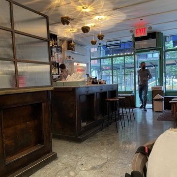 Epistrophy - a view of a restaurant with a bar - Wine Bars Near Me - New York, New York