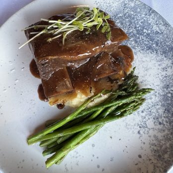The Maple Leaf - Bison short ribs with creamy mashed potatoes and asparagus - Canadian (New) Near Me - Banff, Alberta