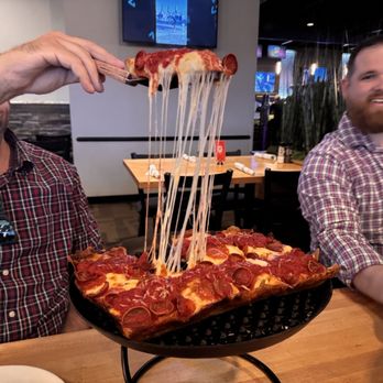 Klavon's Pizzeria & Pub - Look at that cheese pull!!! - Pizza Near Me - Jackson, Michigan Klavon's Pizzeria & Pub - Look at that cheese pull!!! - Pizza Near Me - Jackson, Michigan