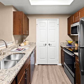 Lakeview at Parkside - Kitchen with stainless steel appliances at Lakeview at Parkside - Apartments Near Me - Farmers Branch, Texas Lakeview at Parkside - Kitchen with stainless steel appliances at Lakeview at Parkside - Apartments Near Me - Farmers Branch, Texas
