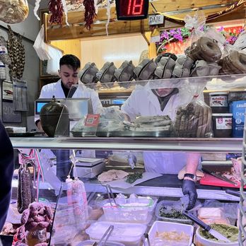 La Vita E'un Mozzico - The owners making panini...they have a refrigerator, sandwich press and back counter...that's it! 1/24/24 - Sandwiches Near Me - Rome, RM La Vita E'un Mozzico - The owners making panini...they have a refrigerator, sandwich press and back counter...that's it! 1/24/24 - Sandwiches Near Me - Rome, RM