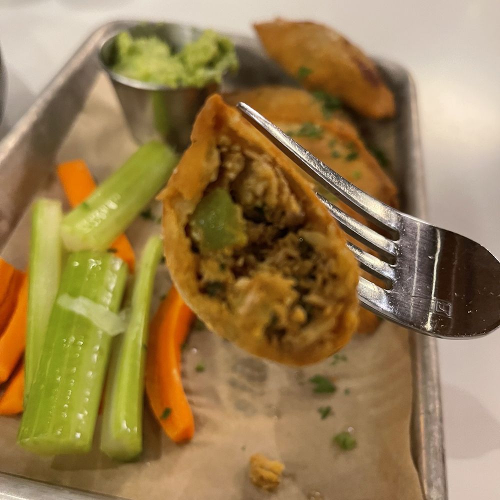 Bronze Bird - CHICKEN EMPANADA - braised chicken w/ guacamole - Beer, Wine & Spirits Near Me - San Diego, California Bronze Bird - CHICKEN EMPANADA - braised chicken w/ guacamole - Beer, Wine & Spirits Near Me - San Diego, California