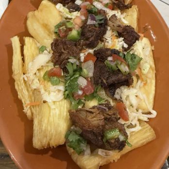 El Mirador - Yuca and chicharrón the chicharrón was either over cooked or left over from another table super hard to eat!! - Salvadoran Near Me - Chicago, Illinois