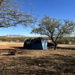 Rancho del Nido - Subaru with hatchback tent and side lean to.