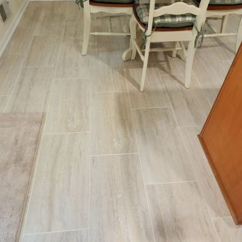Tomco Tile - a dining room table and chairs - Flooring Near Me Tomco Tile - a dining room table and chairs - Flooring Near Me