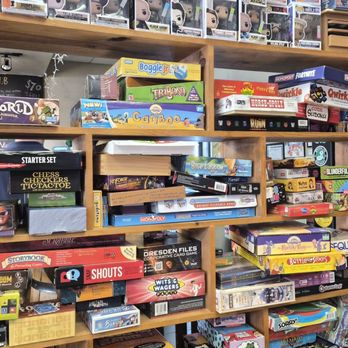 Books & Brews - Brownsburg - Just 1/4 of the game wall to choose from - Bookstores Near Me - Brownsburg, Indiana