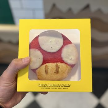 Power Up Cafe - Super Mushroom Calzone (mushroom shaped calzone filled with pepperoni, sausage, mozzarella cheese and tomato sauce) - Themed Cafes Near Me - Universal City, California