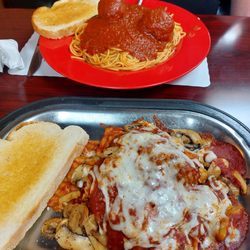 Togi's Family Restaurant - Lasagna topped with grilled mushrooms. Spaghetti with meatballs.